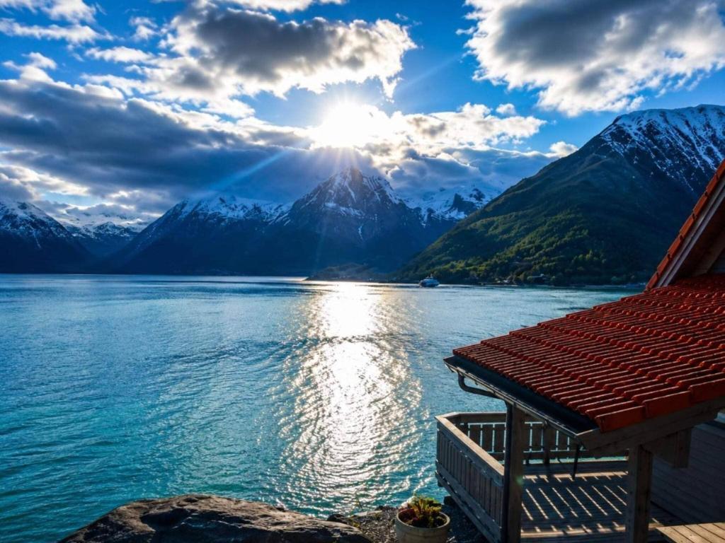 a view of a lake with mountains in the background at 6 person holiday home in Leikanger in Leikanger