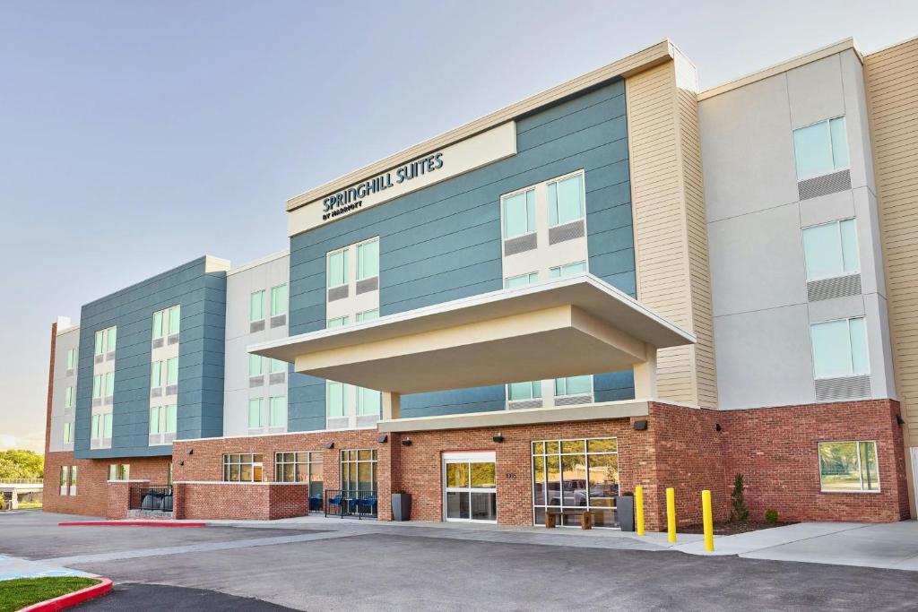 an office building with the front of a hospital at SpringHill Suites by Marriott Chesterfield in Chesterfield