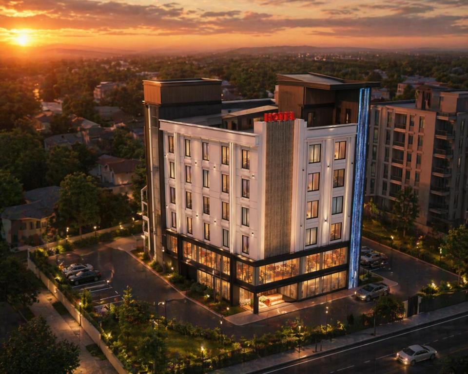 an aerial view of a building at sunset at Hotel Rio in Siliguri