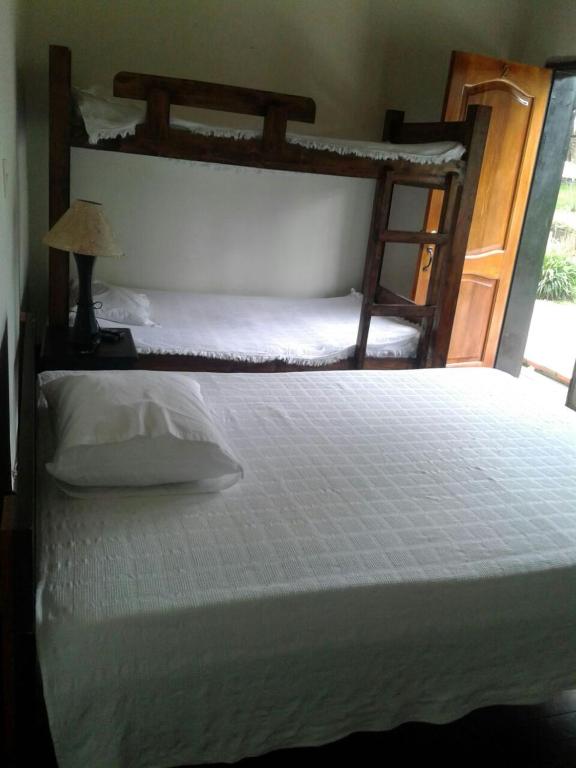 Postel nebo postele na pokoji v ubytování Finca Hotel La Ponderosa