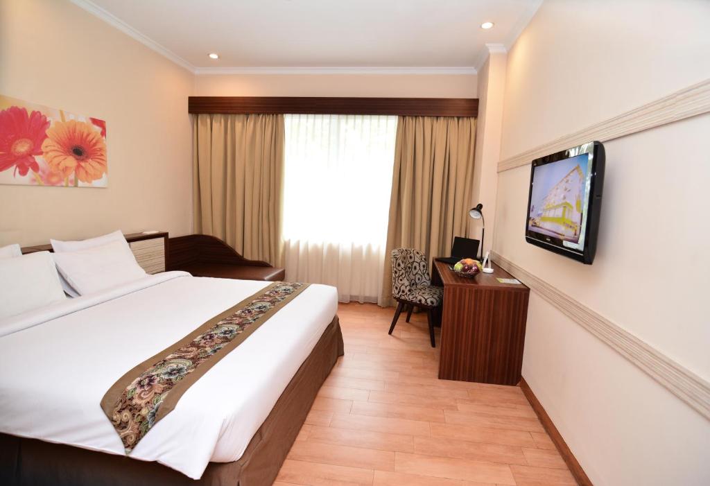 TV a/nebo společenská místnost v ubytování Angkasa Garden Hotel