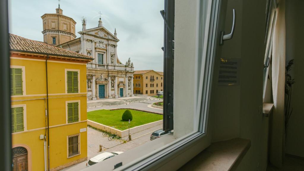 a view of a city from a window at Domus Dantis - Italian Homing in Ravenna
