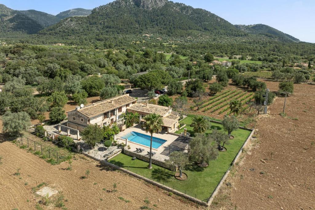 an aerial view of a house with a swimming pool at Finca - Agroturisme Sa Parellada in Binibona