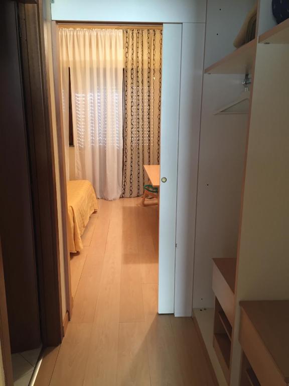 Postel nebo postele na pokoji v ubytování Nuovo Hotel Vigevano