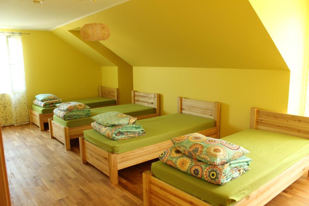 Postel nebo postele na pokoji v ubytování Kuru Villa