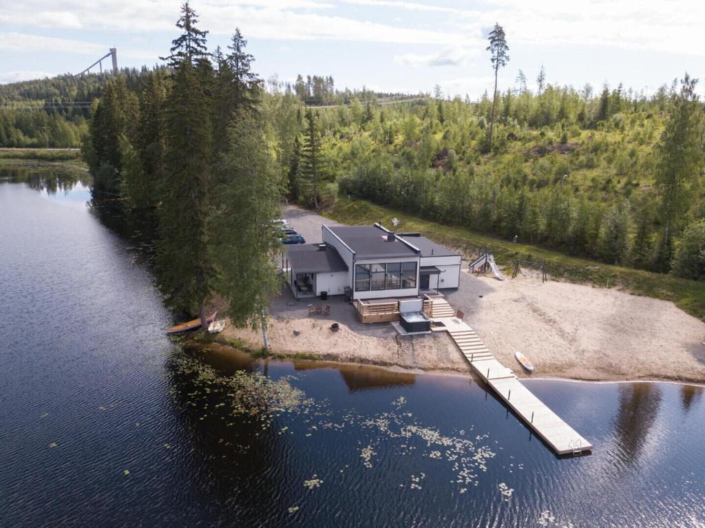 an aerial view of a house on a lake at Himos Pitkäjärvi in Jämsä