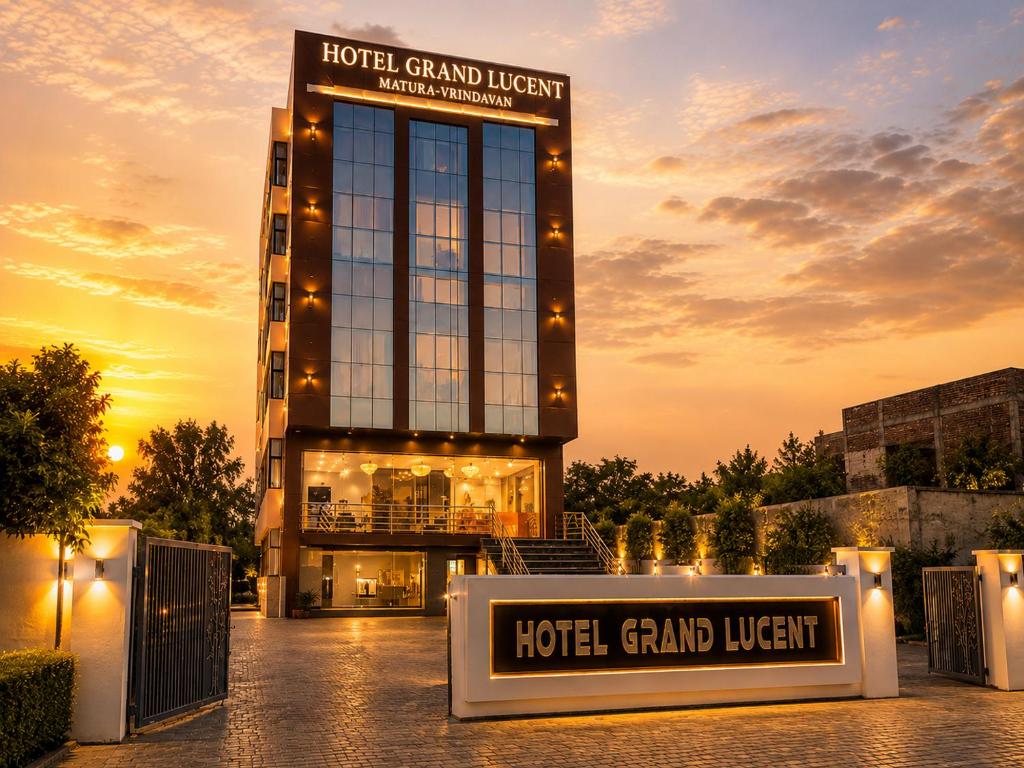 a hotel with a sign in front of a building at Hotel Grand Lucent Mathura-Vrindavan in Gokul
