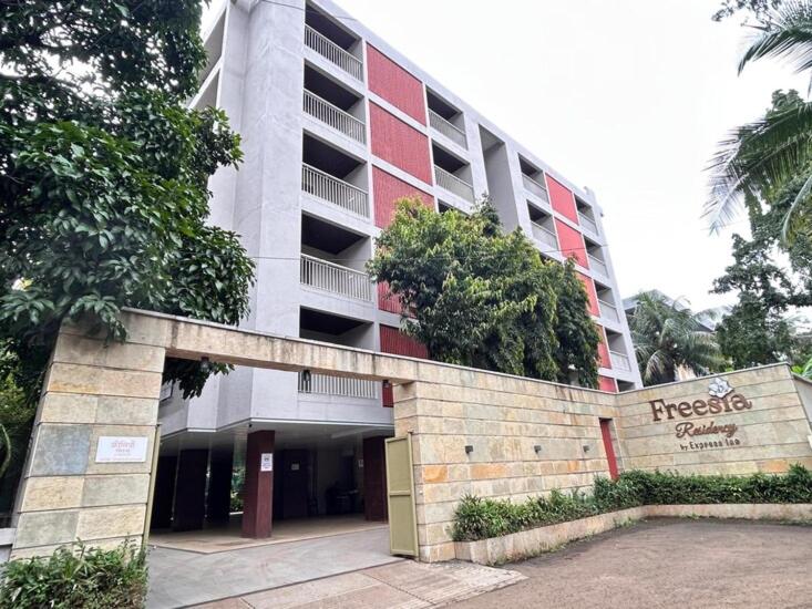 a building with a sign in front of it at Freesia Residency by Express Inn in Nashik