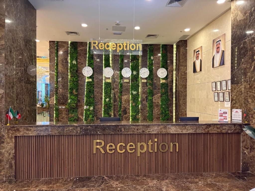 a reception area of a hotel with a reception desk at Garden Hotel in Kuwait