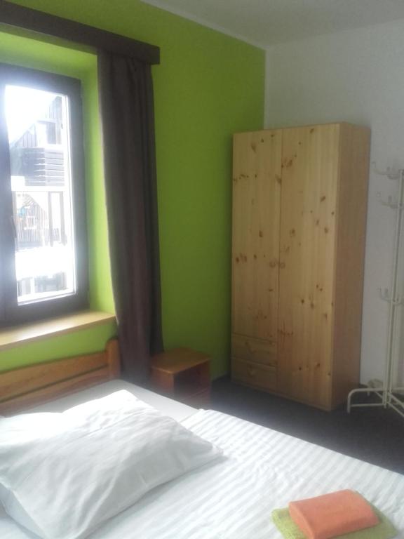 Postel nebo postele na pokoji v ubytování Hotel Anna