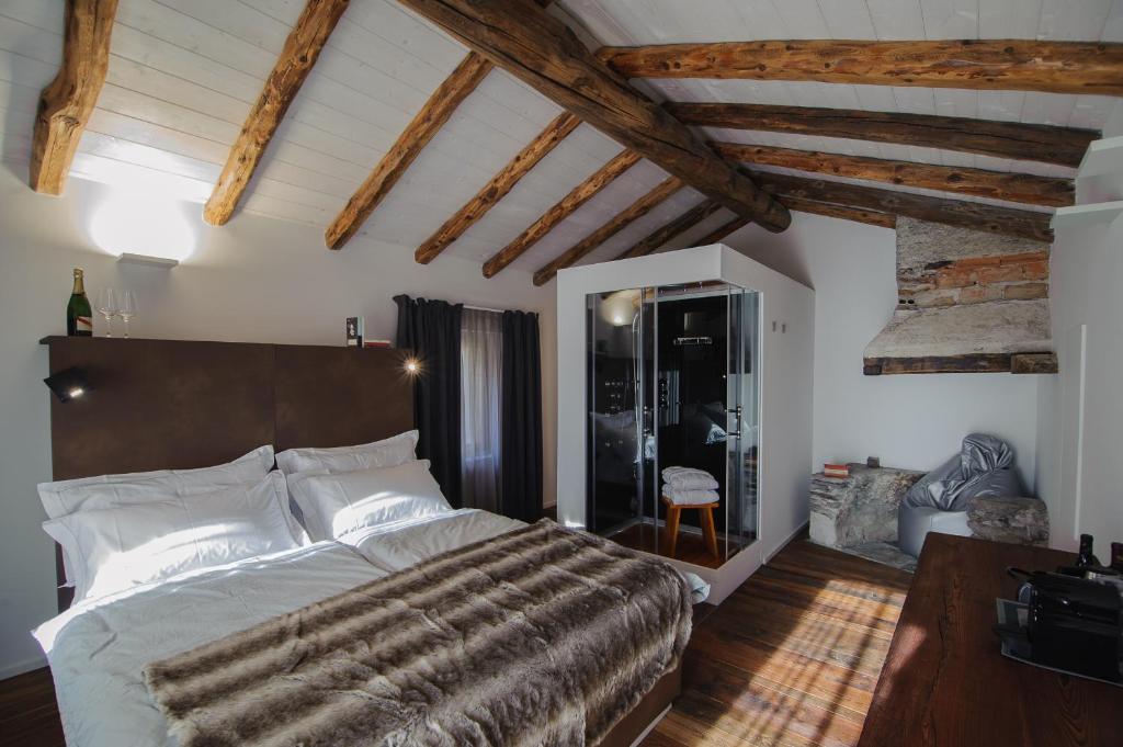 Ліжко або ліжка в номері Chambres d’hôtes La Latteria