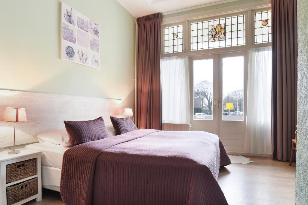 Postel nebo postele na pokoji v ubytování Hotel Corel
