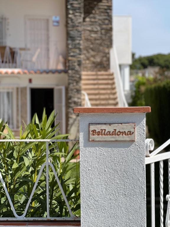 a house with a mailbox in front of a fence at Casa Belladona in Calonge
