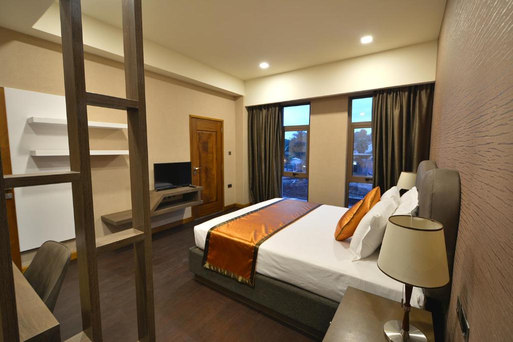 Speke Apartments Wampewoにあるベッド