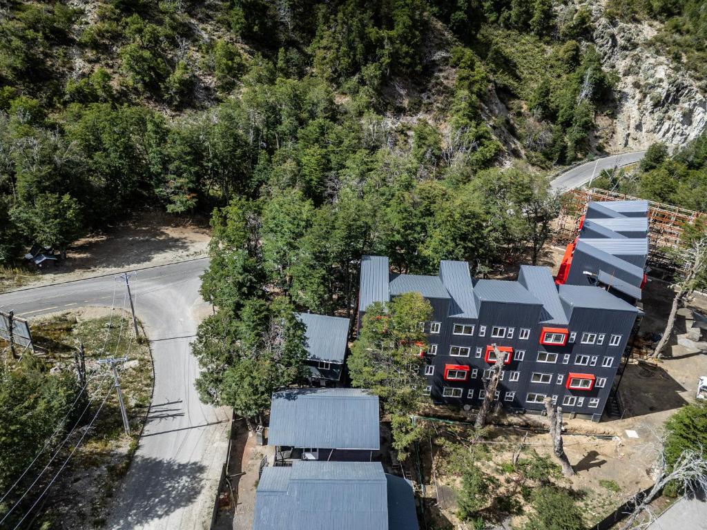an aerial view of a building with red doors at Edificios Refugio in Nevados de Chillan