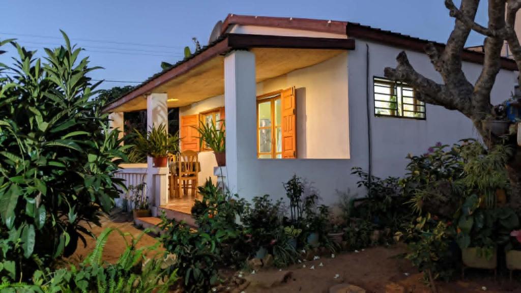 a small house with a front porch at Tsanta lodge in Talata-maty
