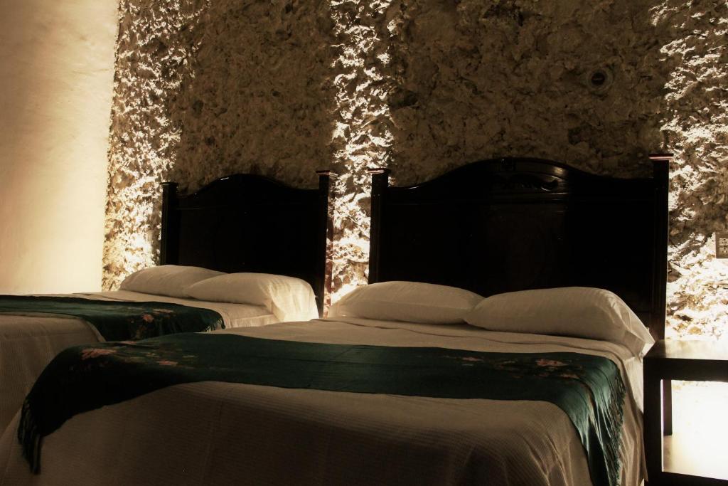 Postel nebo postele na pokoji v ubytování Hotel Zamna Boutique