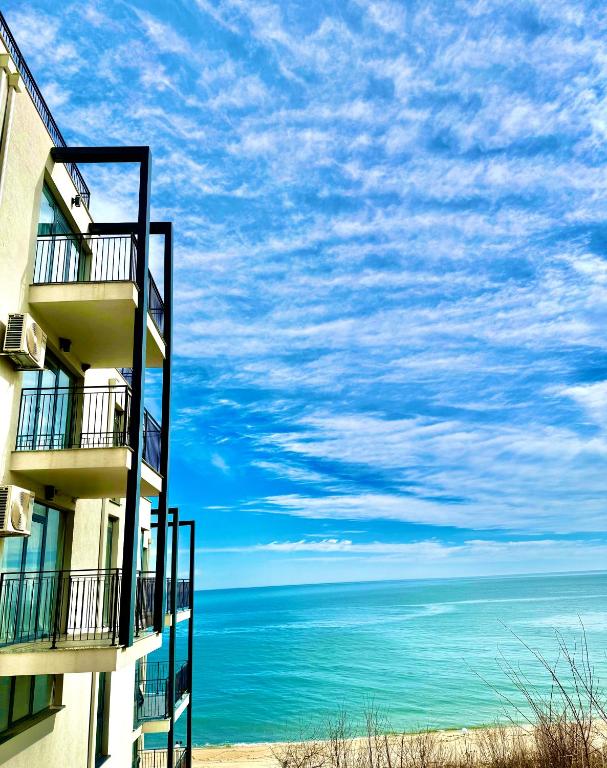 a view of the ocean from a building at Luxe 1 apartments in Obzor