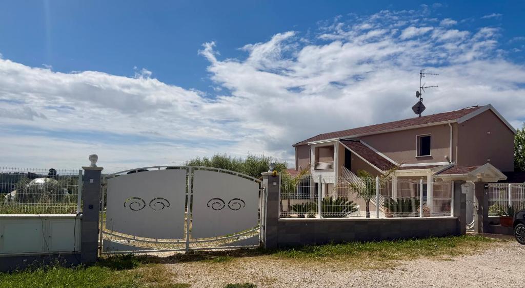 a gate in front of a house at VILLA NATURA in Corropoli