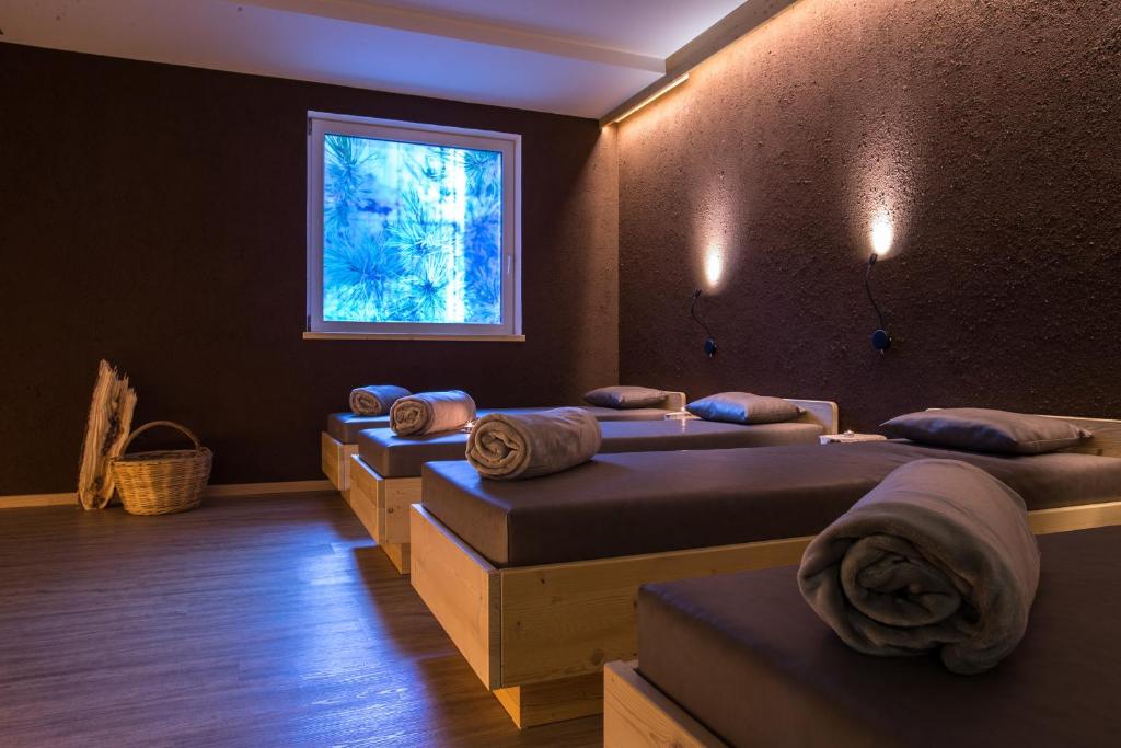 Postel nebo postele na pokoji v ubytování Hotel Erica