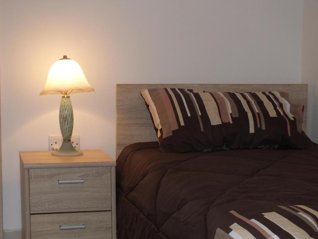 Postel nebo postele na pokoji v ubytování Marjanapartment