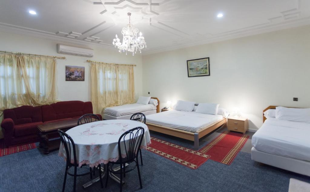 Postel nebo postele na pokoji v ubytování Riad Asma