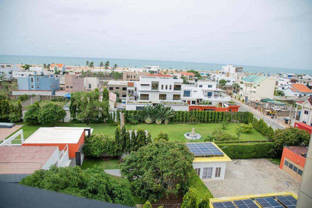 an aerial view of a city with buildings at Atlantic Beach Hôtel Bénin in Cotonou
