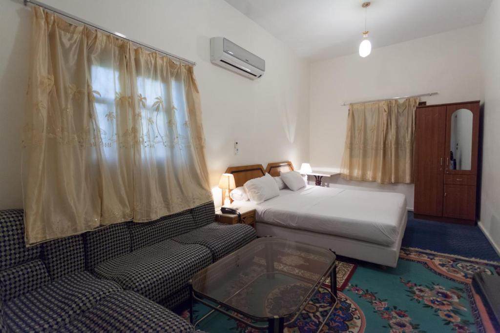 Postel nebo postele na pokoji v ubytování Riad Asma
