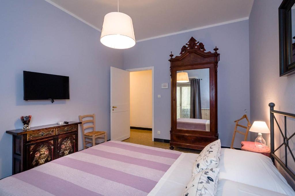 Postel nebo postele na pokoji v ubytování B&B I Portici Di Sottoripa