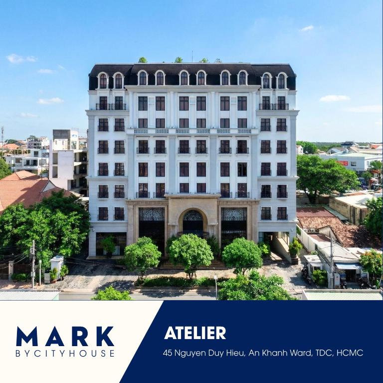 an image of a white building with the words mark after everything at CityHouse - Atelier Thảo Điền in Ho Chi Minh City