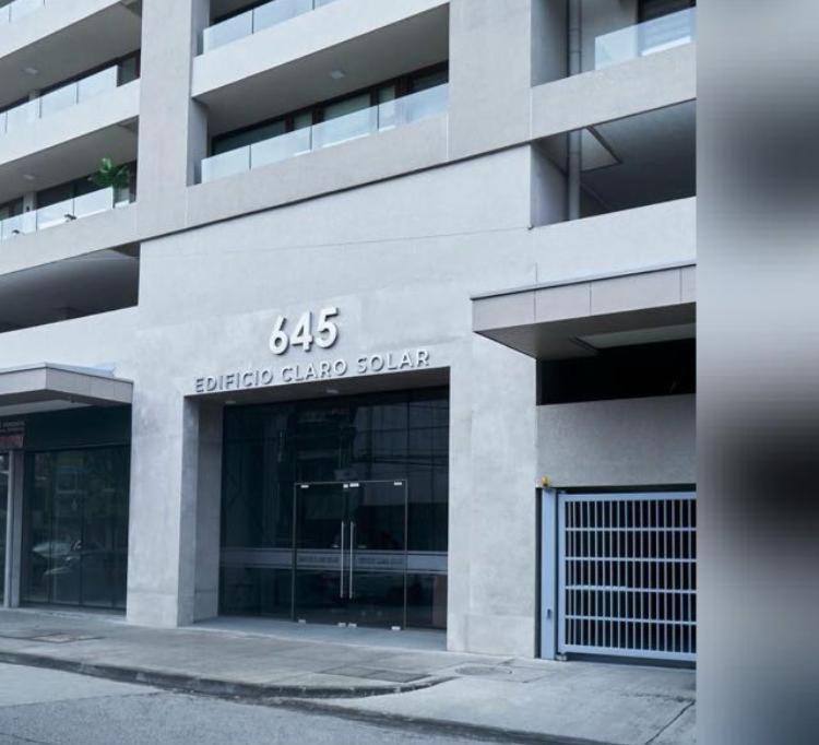 a building with the entrance to a building at Lagos centro Temuco in Temuco