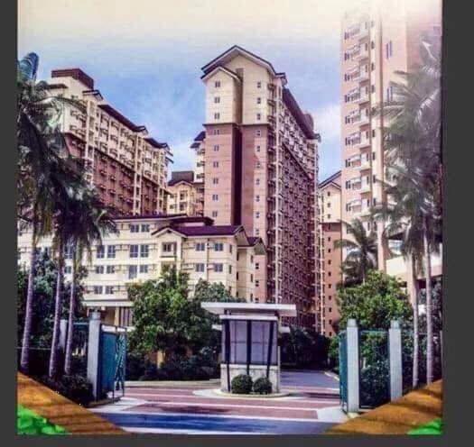 a view of a city with tall buildings at Rochester Garden Condo in Manila
