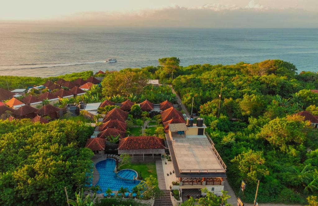 an aerial view of a resort with a swimming pool at D'Gume Villas Lembongan in Nusa Lembongan