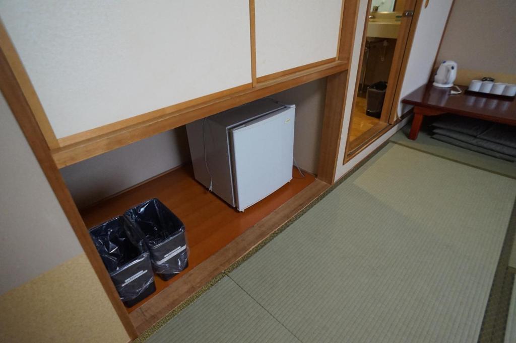Kuchyň nebo kuchyňský kout v ubytování Annex Katsutaro Ryokan