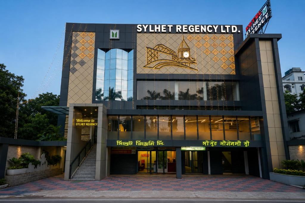 a building with a sign that reads subject recovery ltd at Sylhet Regency Ltd in Sylhet