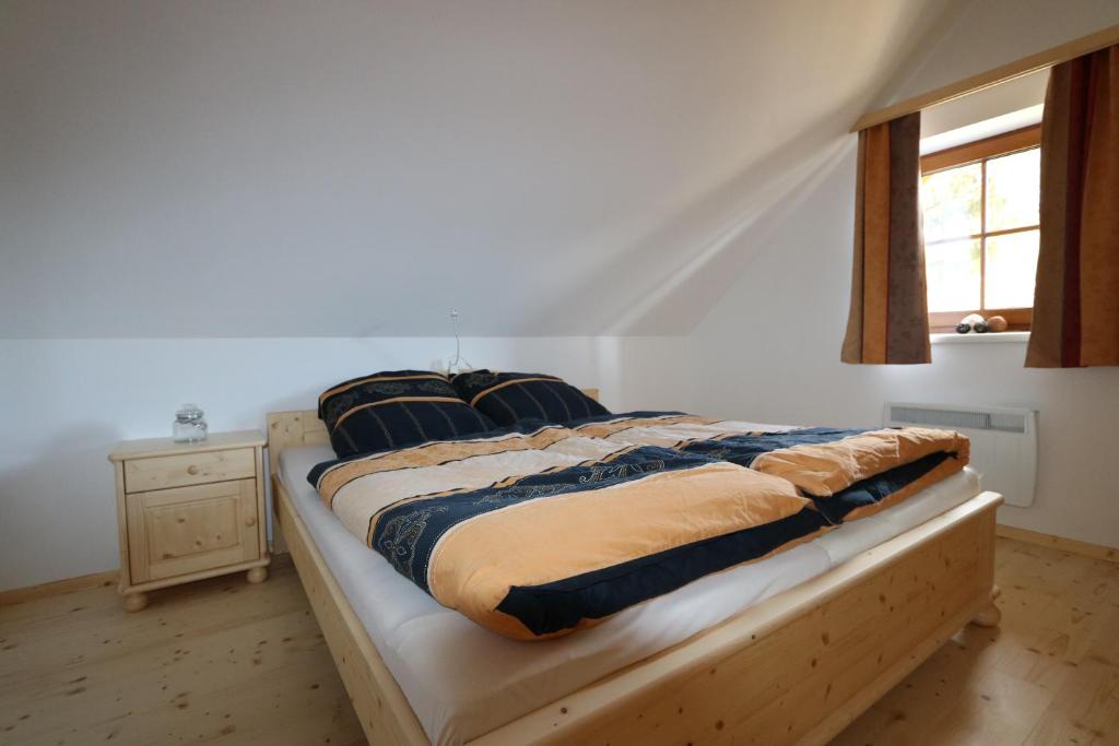 Postel nebo postele na pokoji v ubytování Hüttentraum Flattnitz