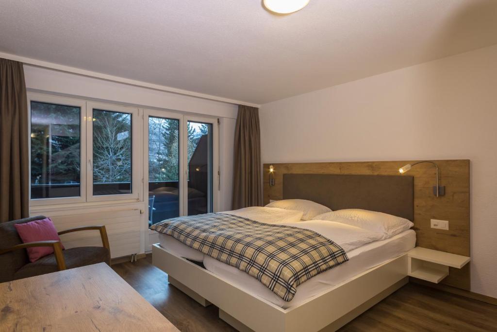 Postel nebo postele na pokoji v ubytování Apartments Patricia
