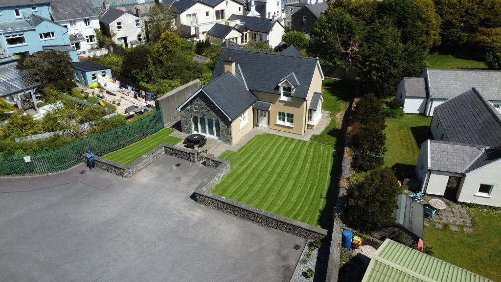 an aerial view of a house with a yard at Number 7 Bank House in Schull