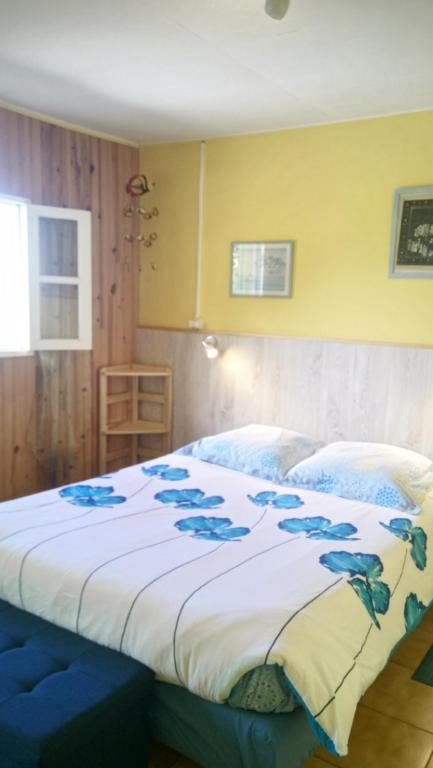 Postel nebo postele na pokoji v ubytování Relais du Volcan