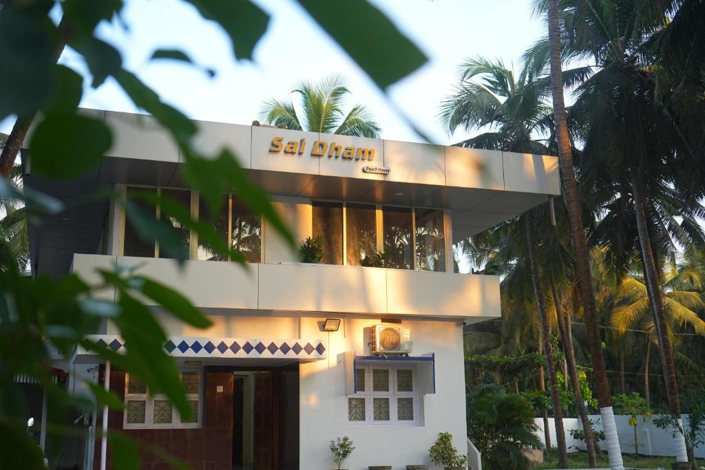a building with a sign that reads salt ginger at Sai Dham Room Stay-01 in Kalyānpur