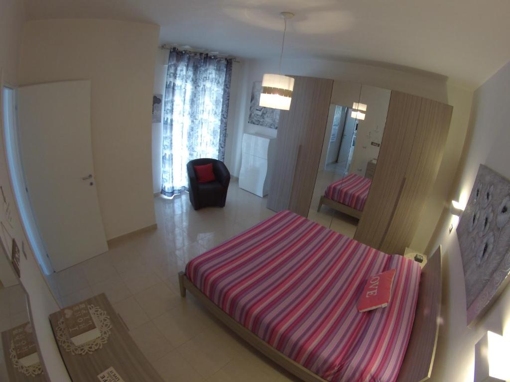 A bed or beds in a room at Villa Buenavista