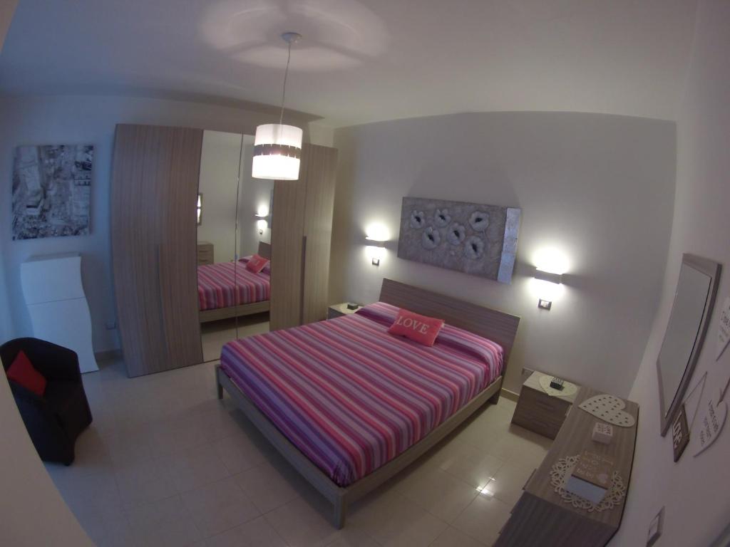 A bed or beds in a room at Villa Buenavista
