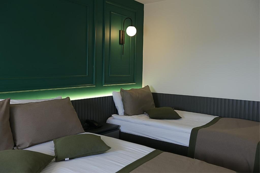 Ren Business Hotel - Quarto Triplo Económico