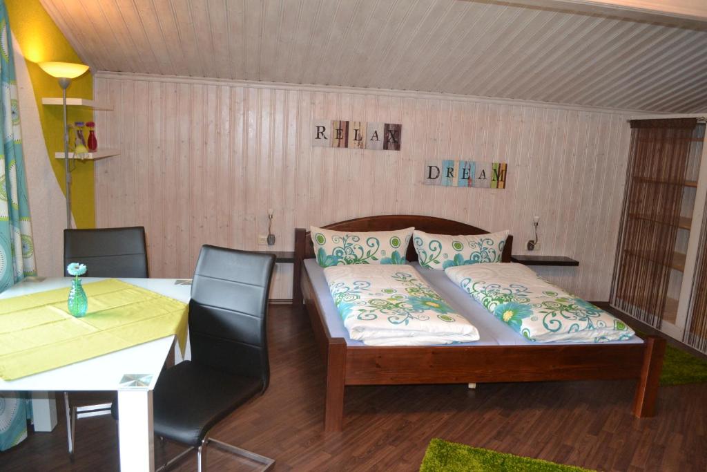 Postel nebo postele na pokoji v ubytování Ferienhaus am Lechweg