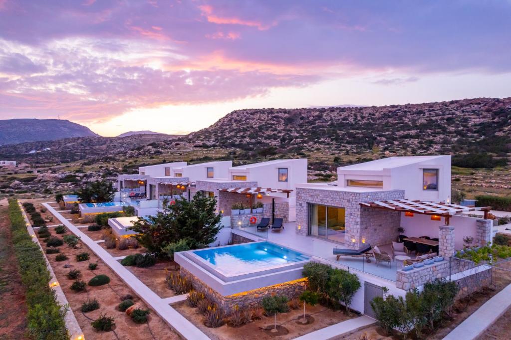an aerial view of a villa with a swimming pool at Aros Luxury Villas in Karpathos