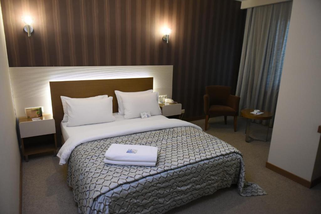 Кровать или кровати в номере Baliktasi City Hotel & Spa