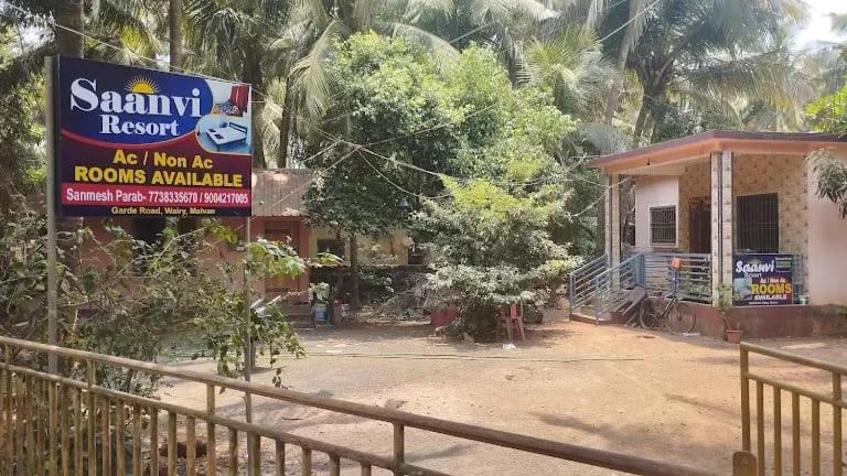 a house with a sign in front of it at Sanvi Resort Malvan in Malvan