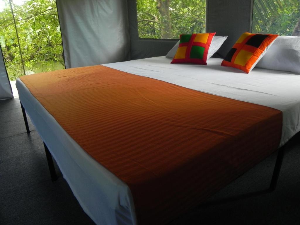 Postel nebo postele na pokoji v ubytování Makulu Safari Camping