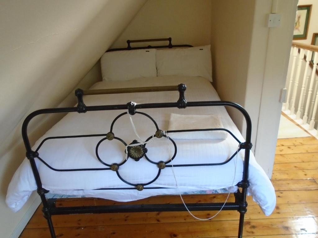 Postel nebo postele na pokoji v ubytování Ballynona House