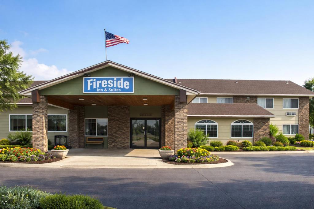 a first bite inn with an american flag on top at Fireside Inn and Suites in Devils Lake